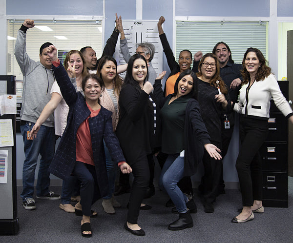 Barco team celebrating new Grey's Anatomy scrub launch